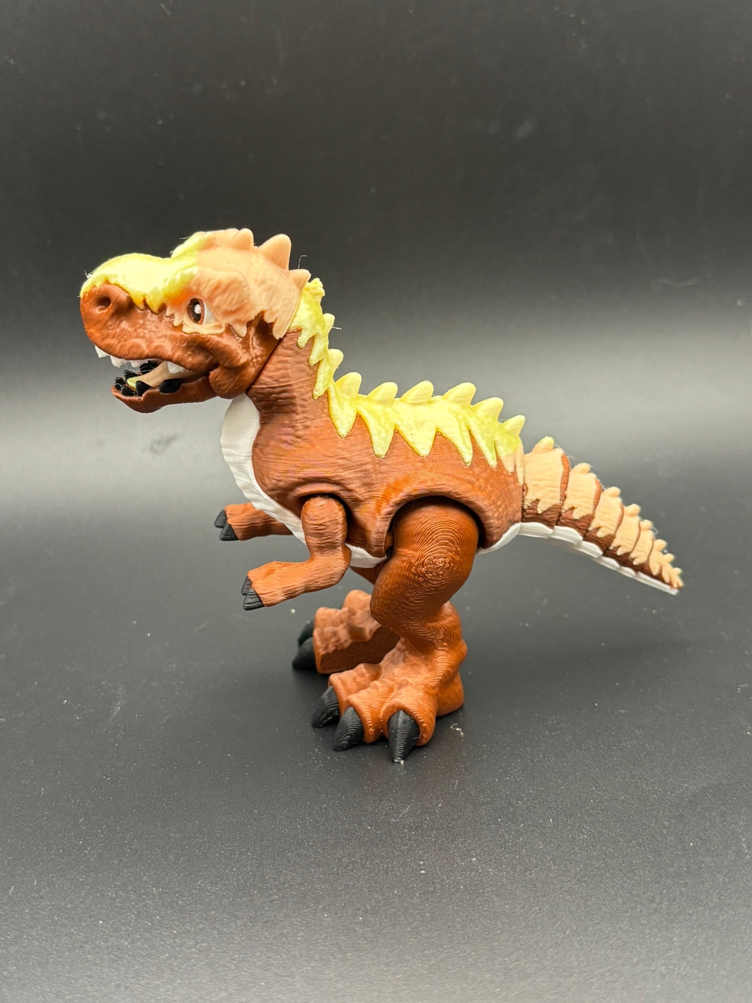 Blaze — Feathered T-Rex Figurine